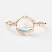 14k yellow gold Grace Ring with 1.8ct rainbow moonstone and small white accent diamonds on band