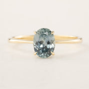 Nina Ring featuring 1.4ct light blue Montana Sapphire set in 14k yellow gold with a classic low profile four-prong setting