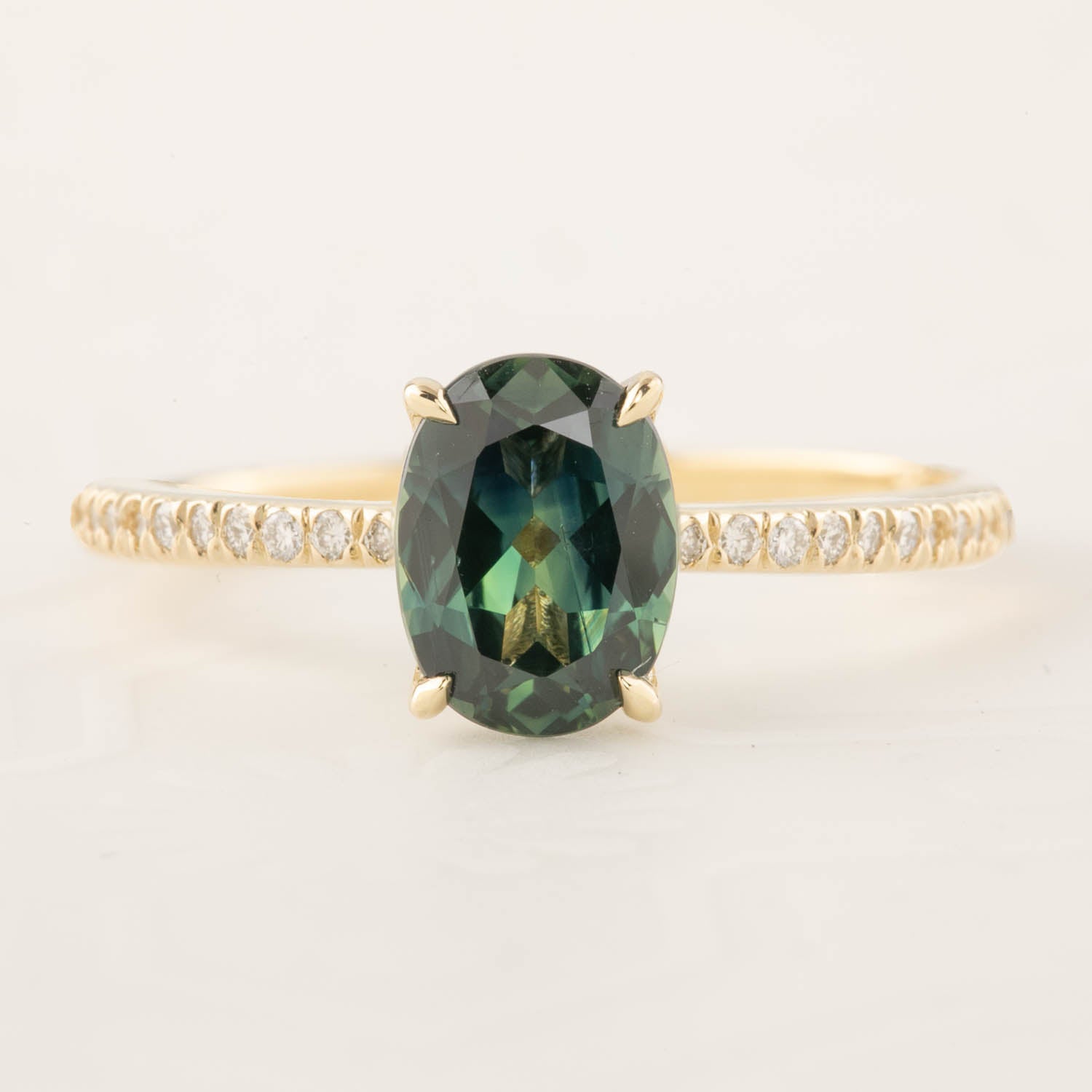 Gold ring with 1.53ct unheated oval green Queensland sapphire and diamond accents, size 7, ethical 14k design