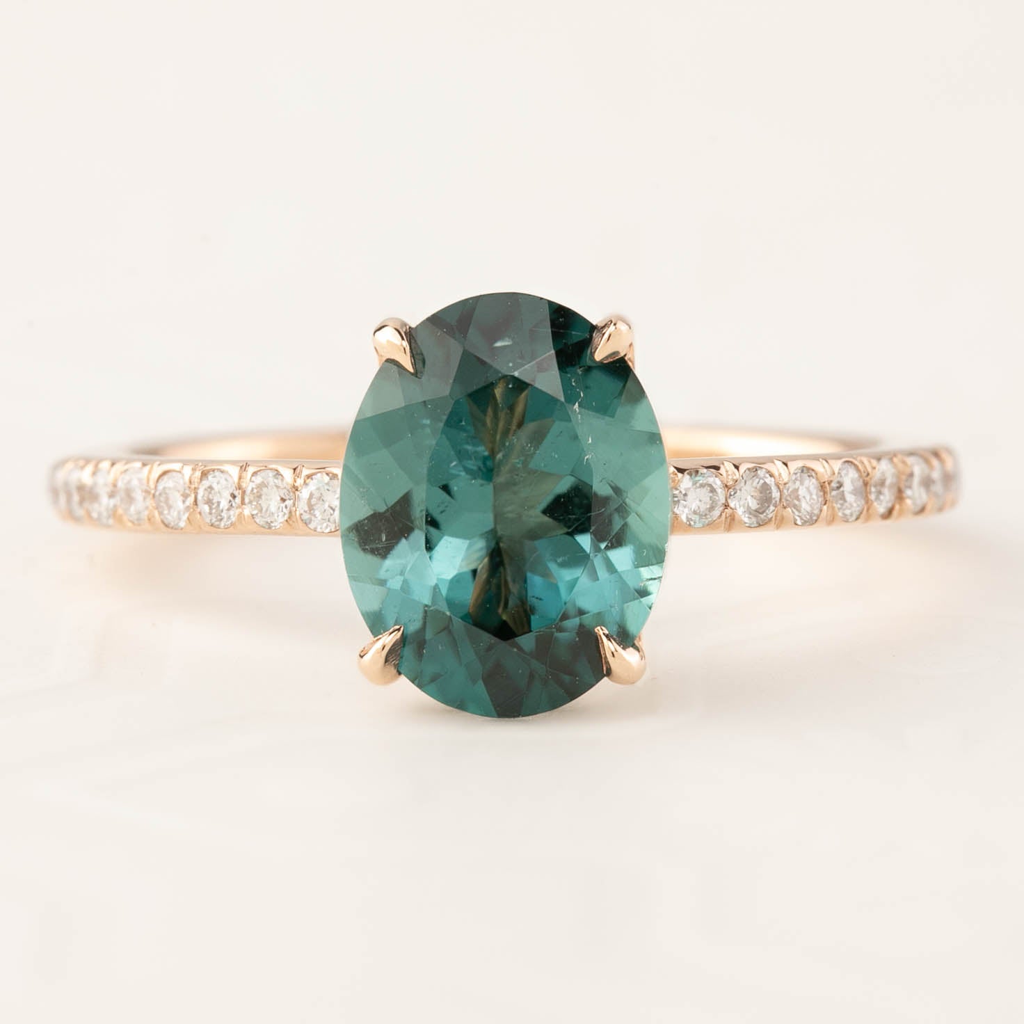 Maria Ring featuring 1.8ct Namibian green tourmaline and white diamonds set in 14k rose gold, handmade and ethically sourced.