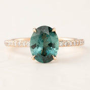 Maria Ring featuring 1.8ct Namibian green tourmaline and white diamonds set in 14k rose gold, handmade and ethically sourced.
