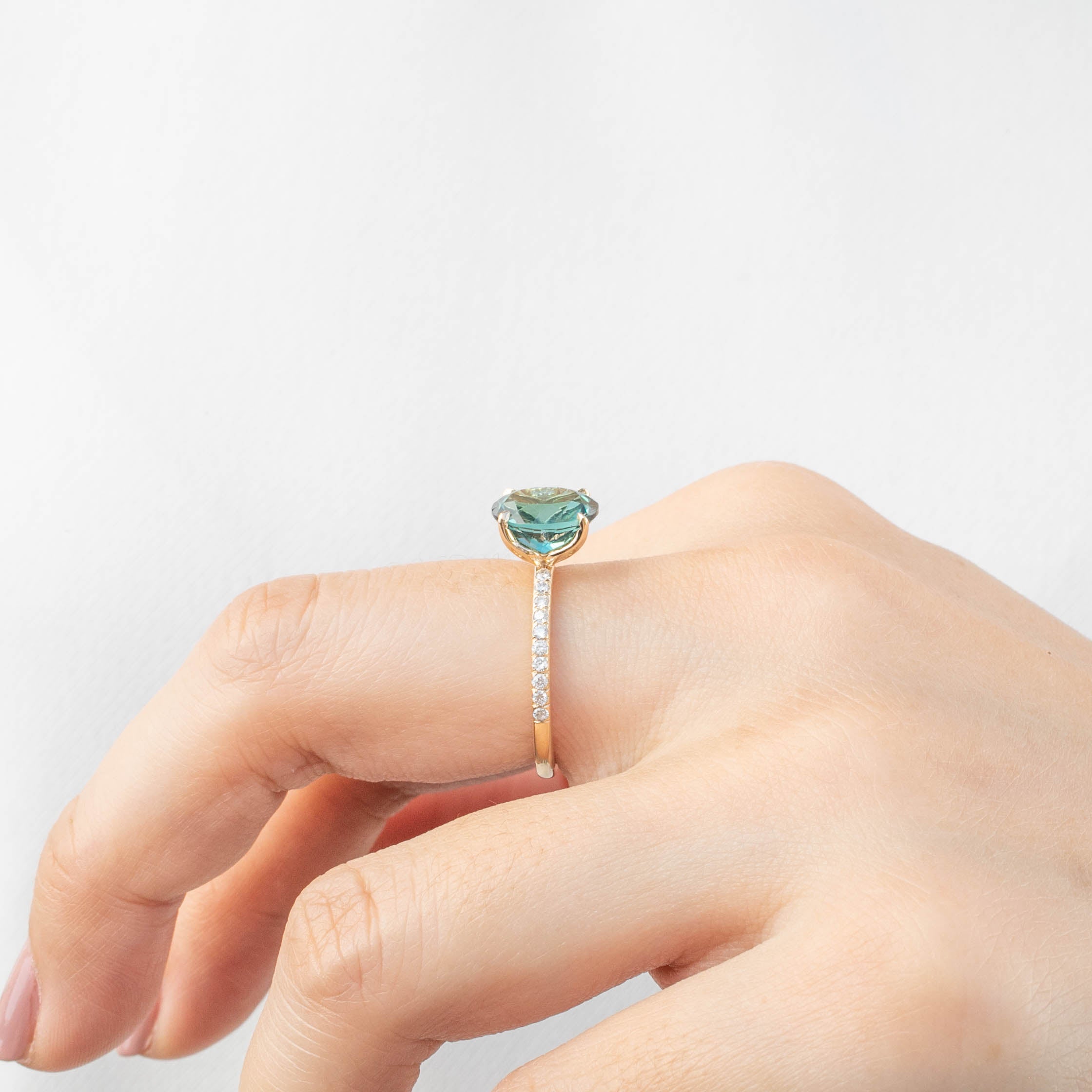 Maria Ring with 2.47ct Namibian green tourmaline and diamond accents, handmade with ethically sourced gold.