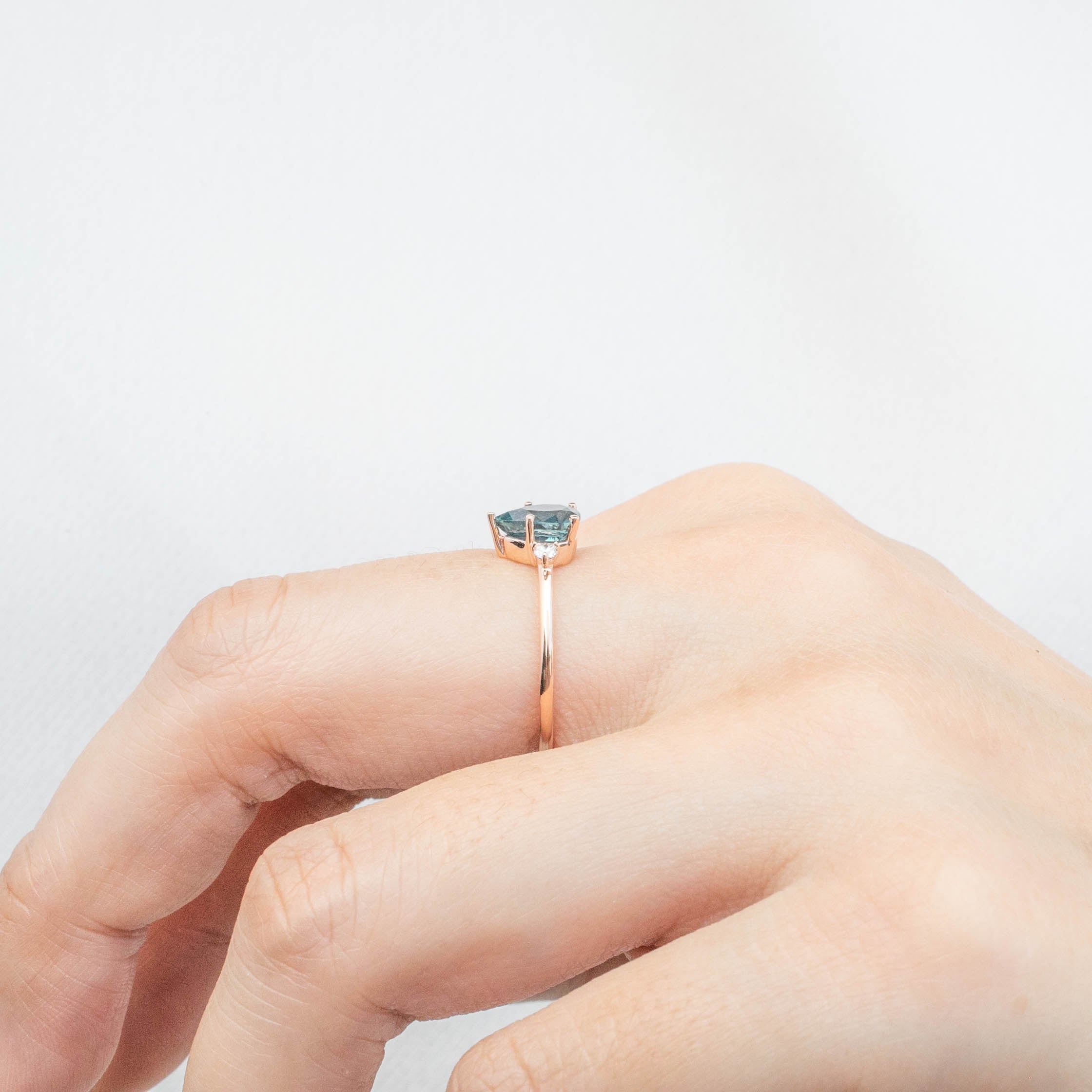 Emilie Ring featuring 1.07ct pear cut blue-green Montana sapphire set in 14k rose gold, handmade and one of a kind.
