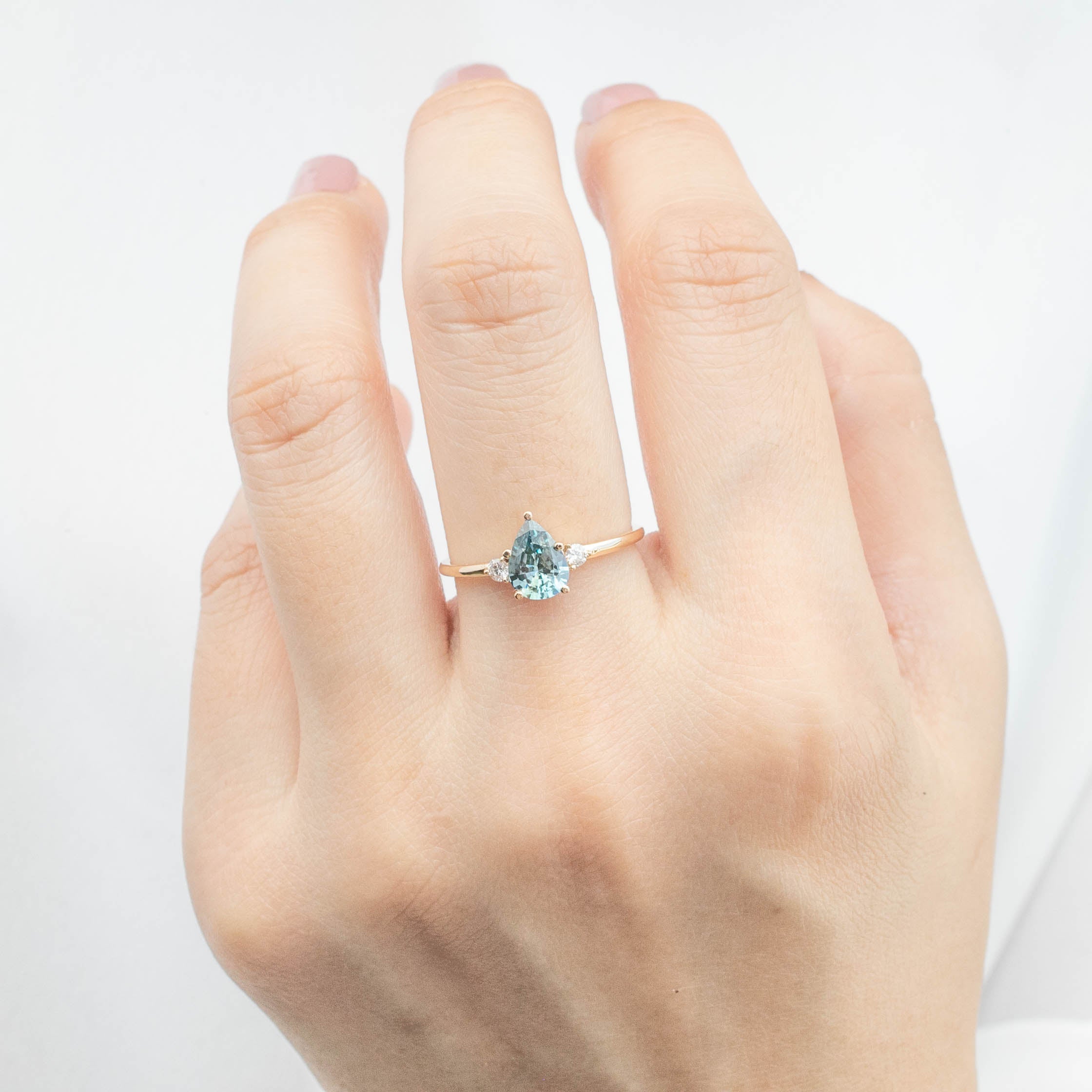 Emilie Ring with 0.84ct pear cut blue Montana sapphire on a recycled 14k yellow gold band, handmade and unique