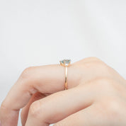 Emilie Ring featuring 0.84ct pear cut Blue Montana Sapphire on a handmade recycled 14k gold band, one of a kind design