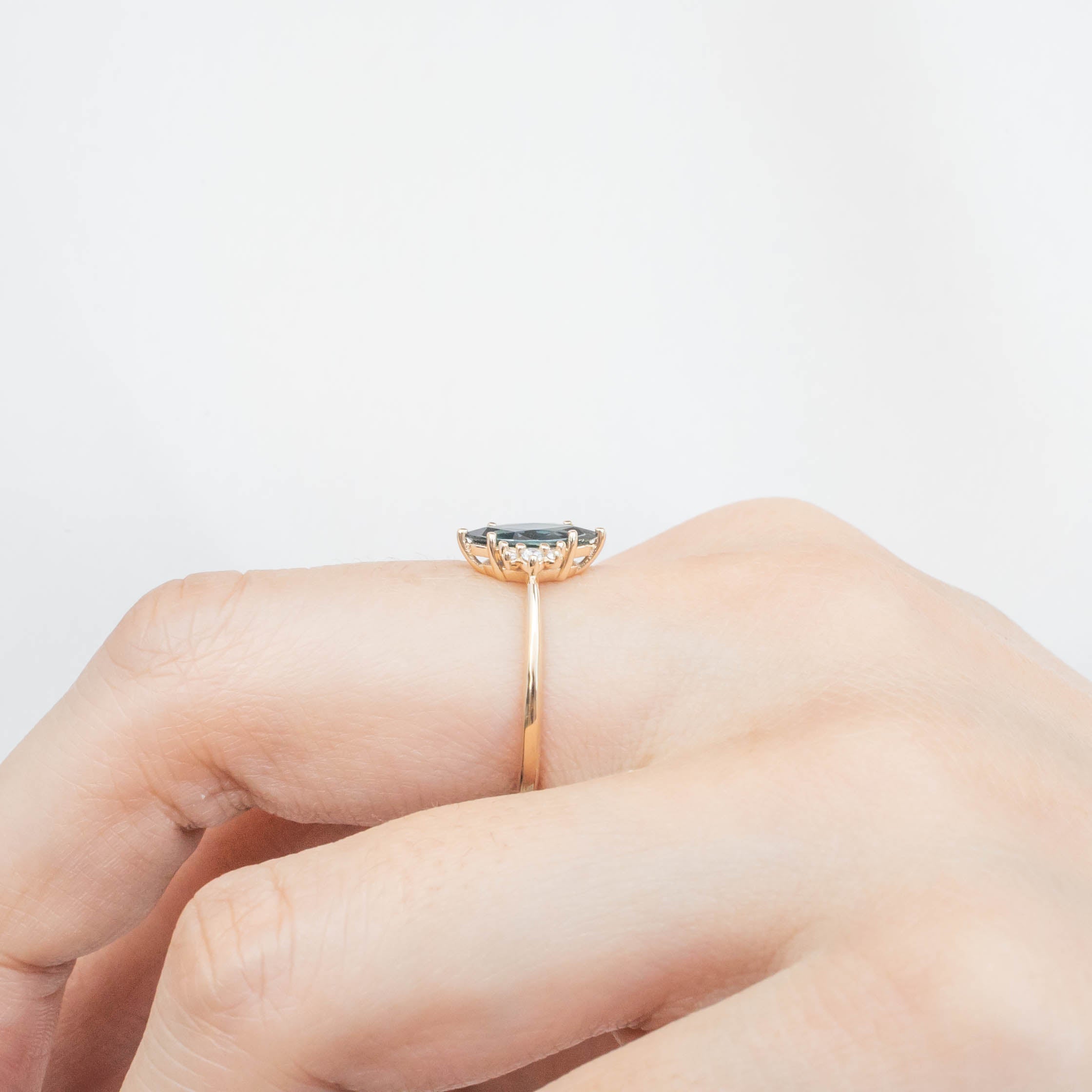 Lena Ring with 0.94ct marquise dark blue green sapphire set in recycled 14k gold, handmade and ethically sourced