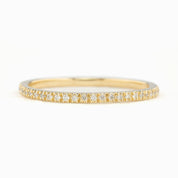 Thin 1.3mm gold band with natural white diamonds, G color SI clarity, ethically sourced and packaged in kraft box