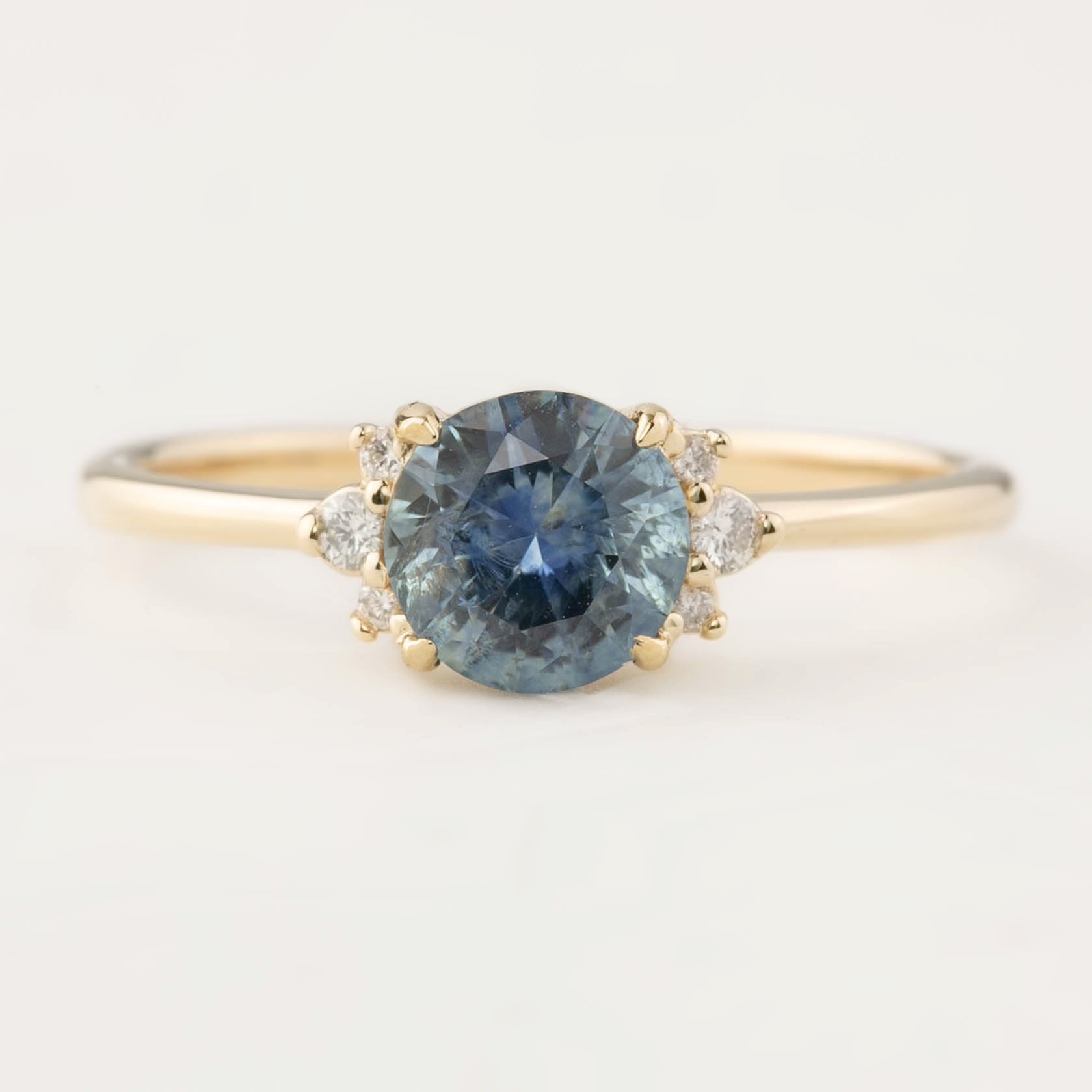 Lena Ring with 1ct Blue Montana Sapphire and diamond accents set in recycled 14k yellow gold, handmade and one of a kind