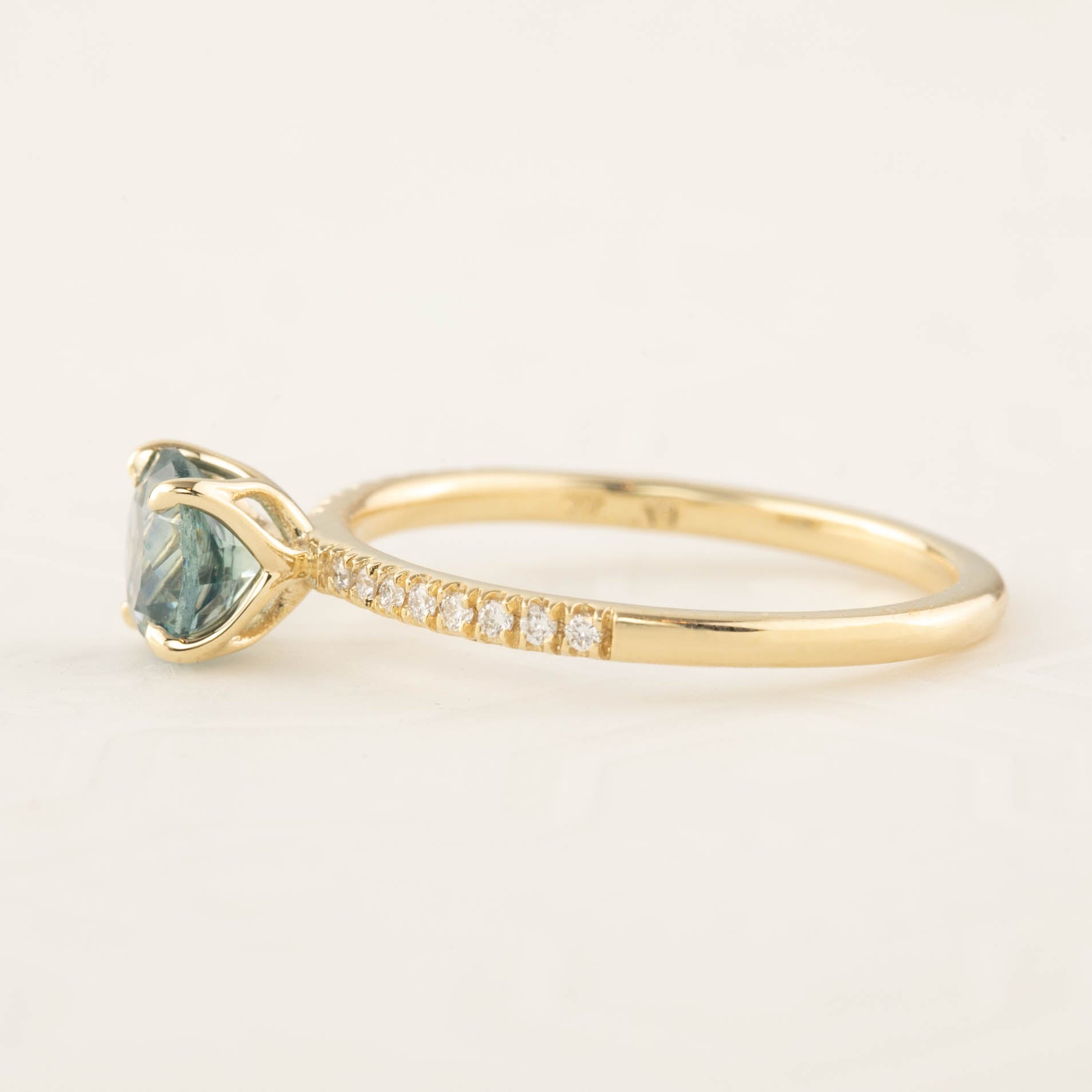 Maria Ring with 1.12ct green Montana sapphire set in recycled 14k gold, featuring white accent diamonds, one of a kind design