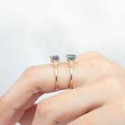 Handmade Estel Ring one of a kind with 1.41ct blue sapphire in recycled 14k gold, shown on two fingers