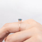 Estel Ring featuring a 1.18ct teal blue Montana sapphire set in recycled 14k rose gold, handmade and one of a kind.