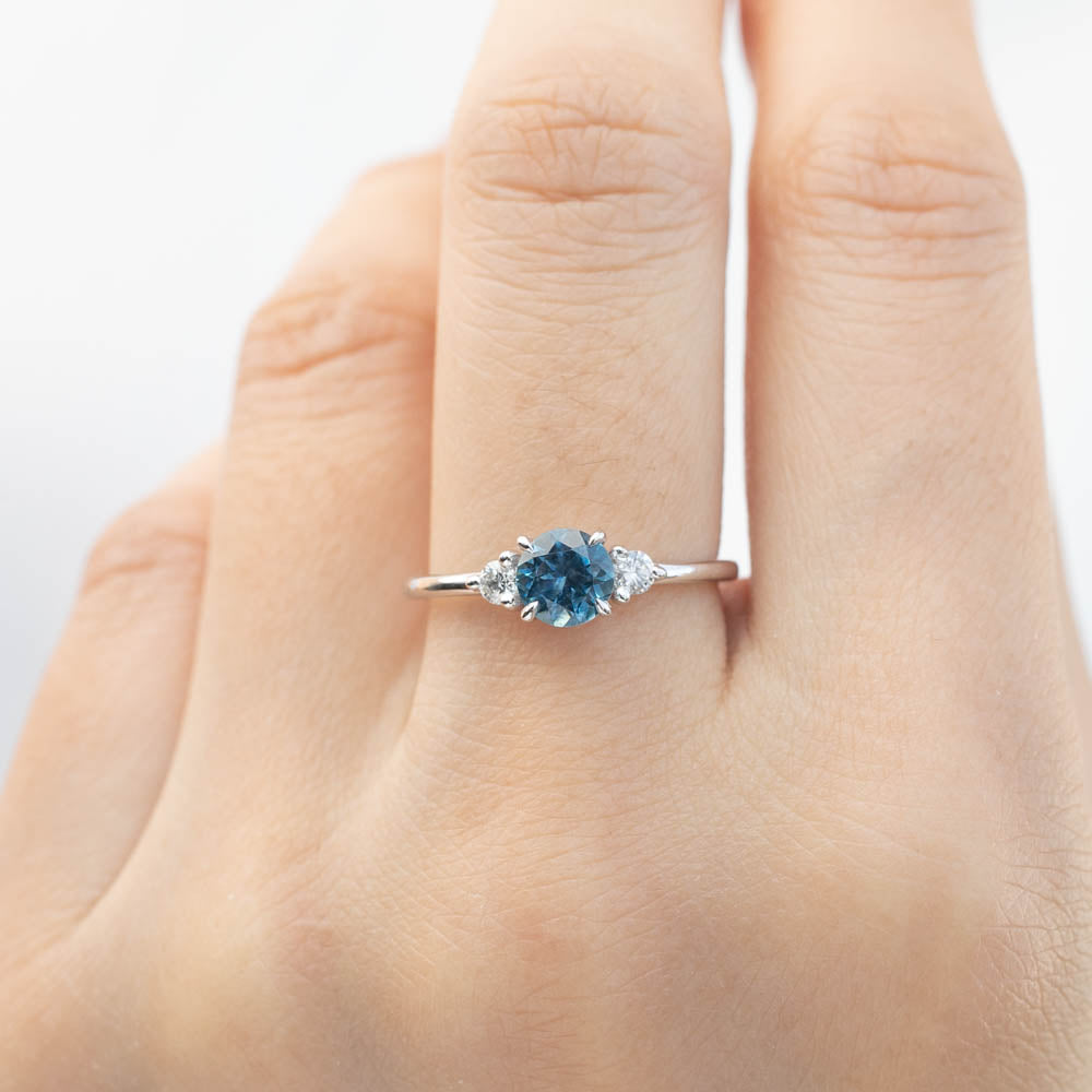 Emilie Ring with 0.84ct Blue Montana Sapphire and diamonds set in recycled 14k white gold, handmade and authentic.