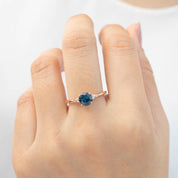 Estel Ring featuring a 1.05ct teal blue Montana sapphire set in 14k rose gold, one of a kind handmade design.