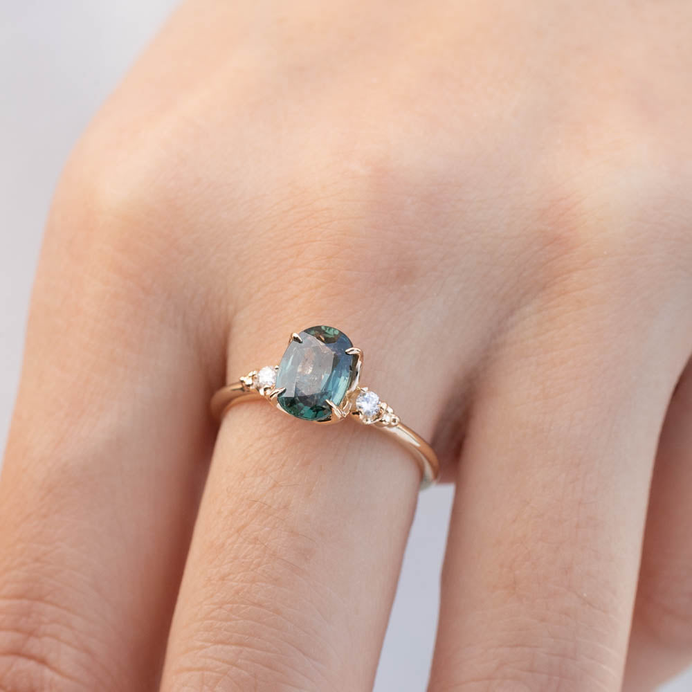 Estel Ring 1.72ct peacock green sapphire with diamond accents, handmade in recycled 14k gold band.