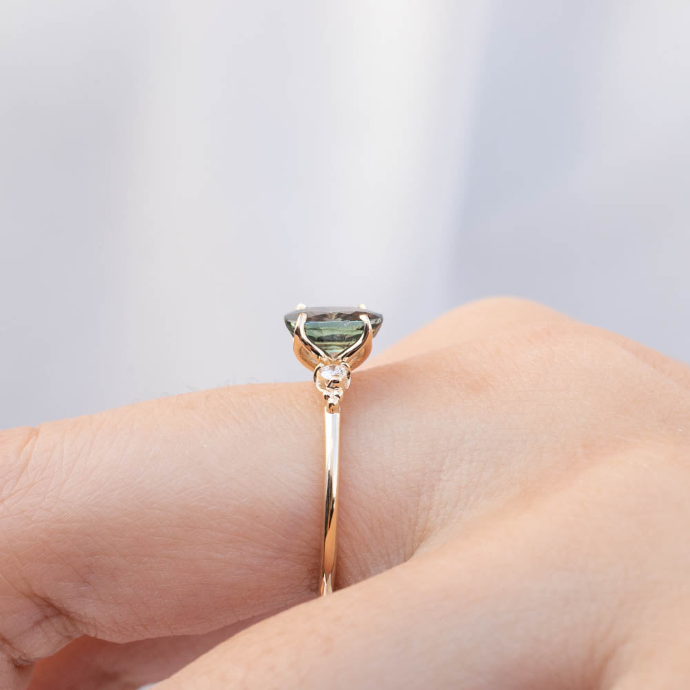 Estel Ring with 1.72ct peacock green sapphire, handmade and ethically sourced in recycled 14k gold setting.