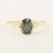 Estel Ring with 1.72ct peacock green sapphire in recycled 14k gold, accented with white diamonds, one of a kind design.