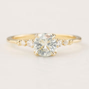 Estel Fleur Four Prongs Ring with 0.90ct white Montana sapphire, handmade in recycled 14k gold with diamonds.