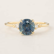 Estel Ring featuring a 1.58ct parti blue Montana sapphire with accent diamonds in 14k recycled gold, handmade and ethical.