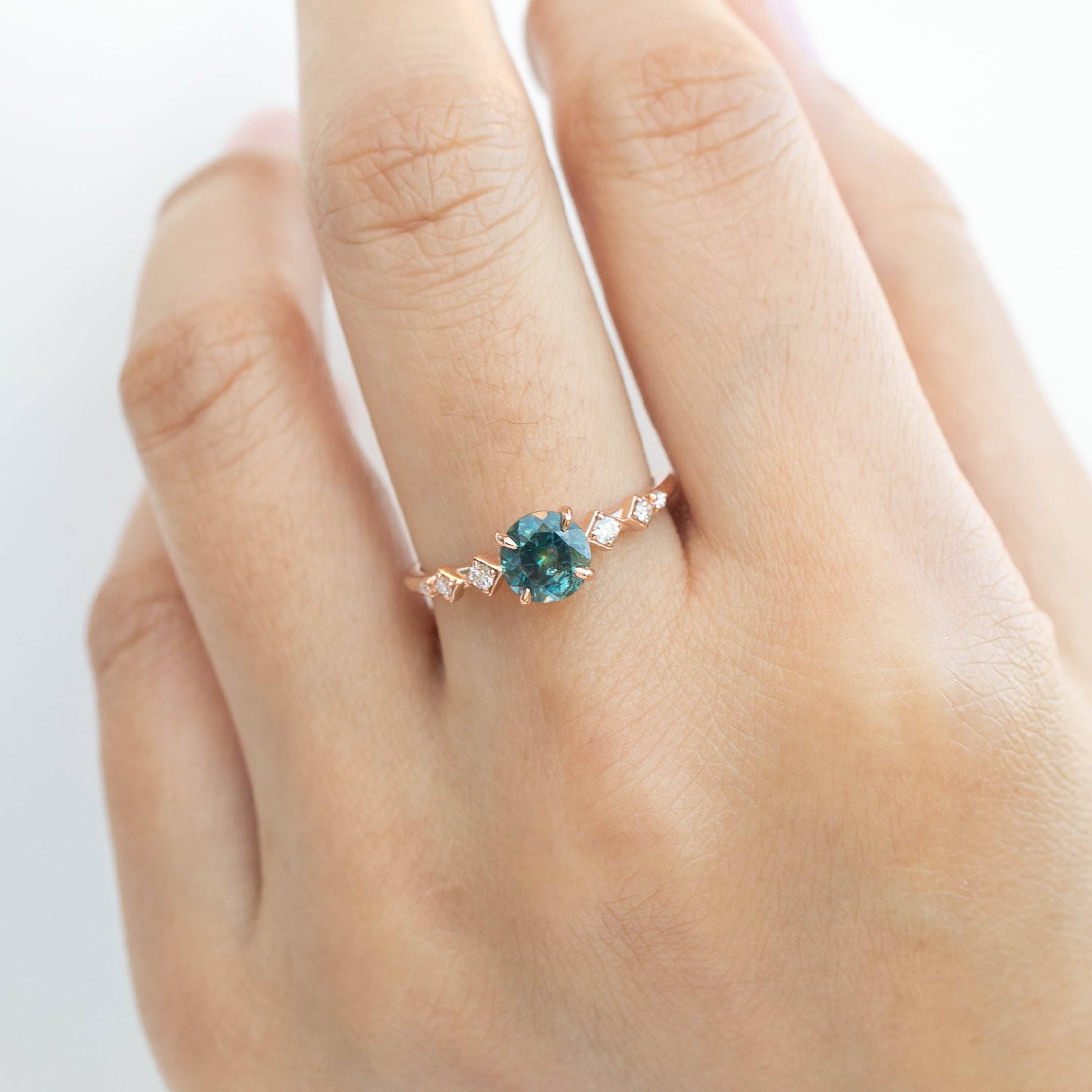 Celeste Ring with 1.19ct teal blue Montana sapphire and accent diamonds in 14k rose gold, handmade and one of a kind.