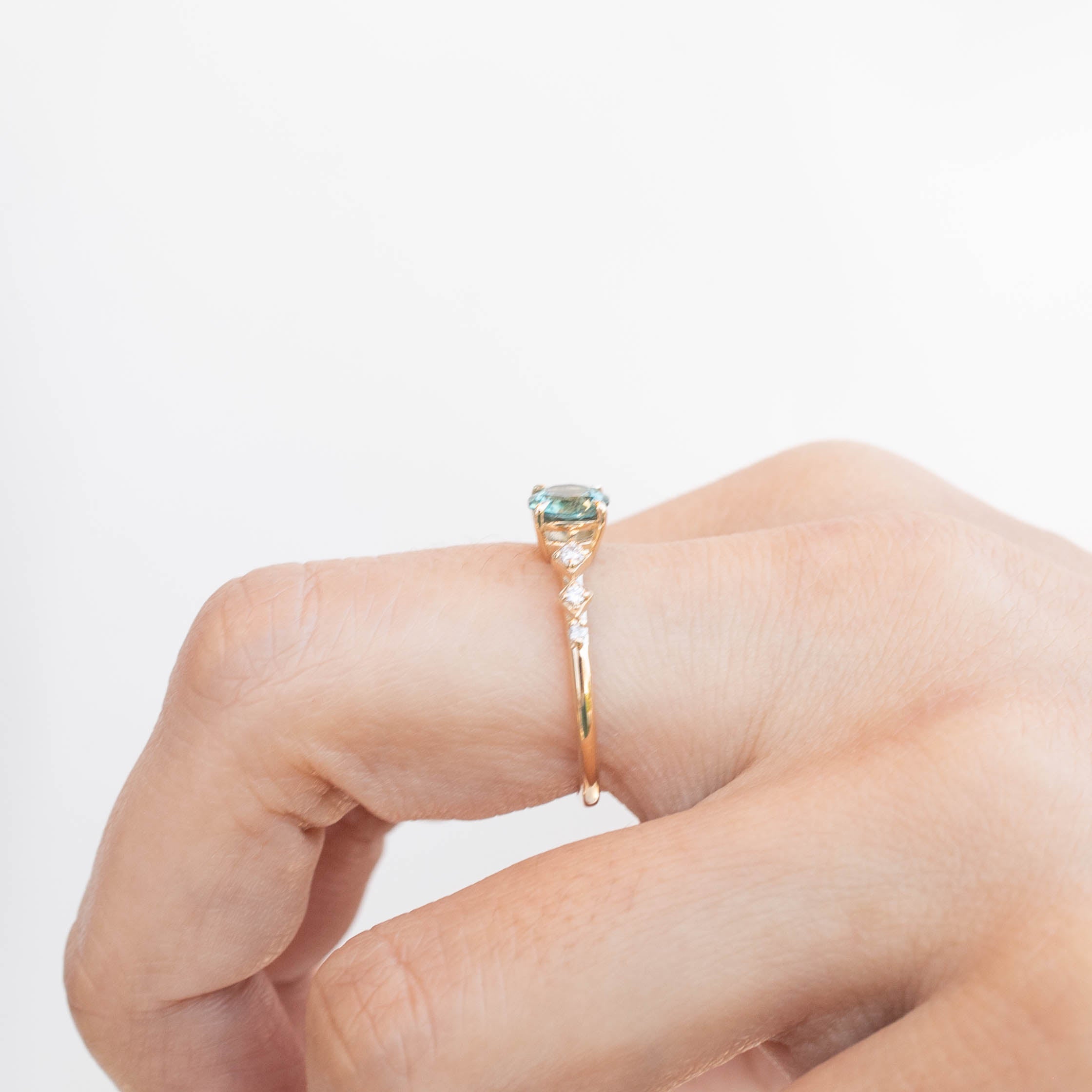 Celeste Ring with 0.89ct blue green Montana Sapphire in recycled 14k gold, handmade and ethically sourced unique ring