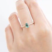 Maria Ring with 1.31ct pear cut light blue green Montana sapphire, handmade ethically sourced by Envero Jewelry