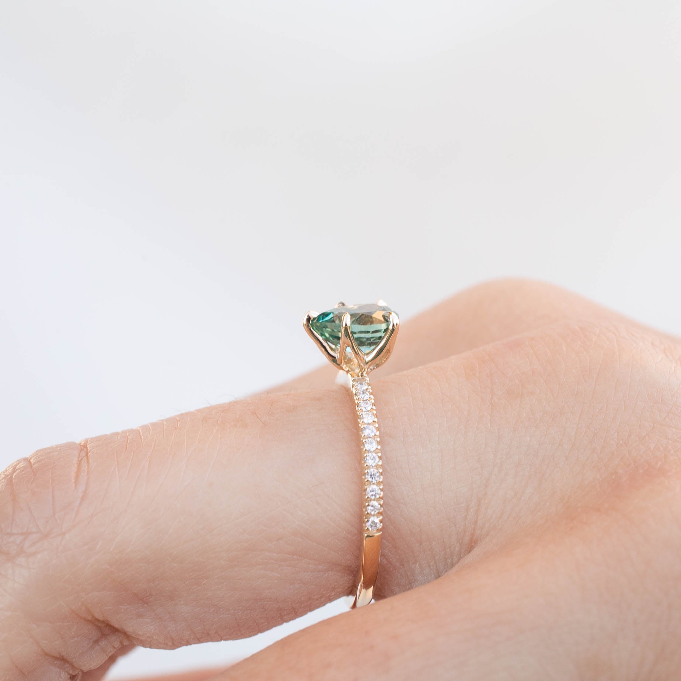 Maria Ring 1.31ct pear cut light blue green Montana sapphire with diamonds handmade by Envero Jewelry