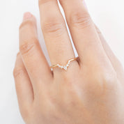 Bella's Crown Ring with natural white diamonds on ethically sourced solid gold, worn on a hand, minimalist design.