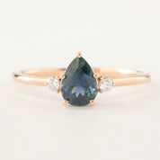 Emilie Ring with 0.90ct pear teal Montana sapphire and diamonds in handmade 14k rose gold setting