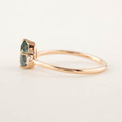 Emilie Ring featuring a 0.87ct pear teal Montana sapphire set in 14k rose gold, handmade and one of a kind.