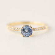 Sabrina ring with 0.88ct round Ceylon blue sapphire and diamond accents in 14k recycled gold band