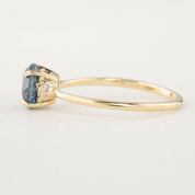 Emilie Ring with 1.52ct Blue Montana Sapphire set in recycled 14k gold with white diamond accents, handmade and one of a kind.