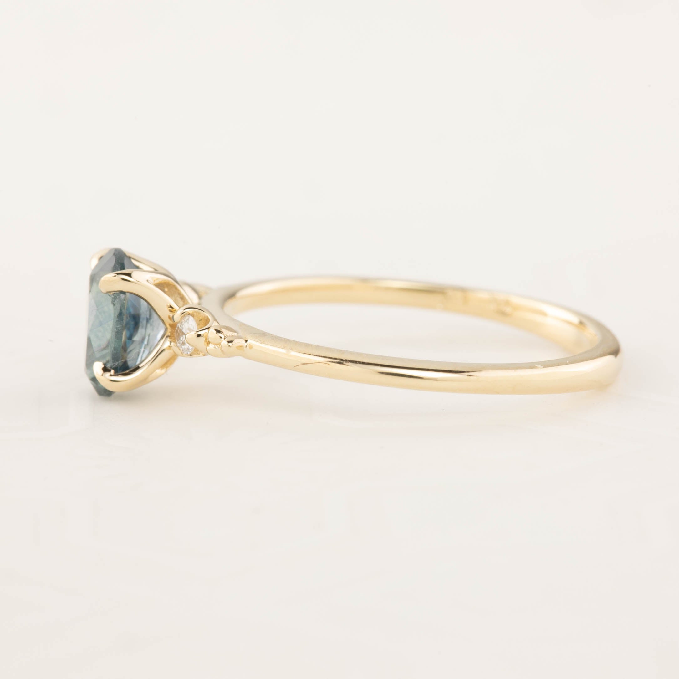 Estel Ring with a 1.10ct blue green Montana sapphire set in recycled 14k gold, handmade and ethically sourced.