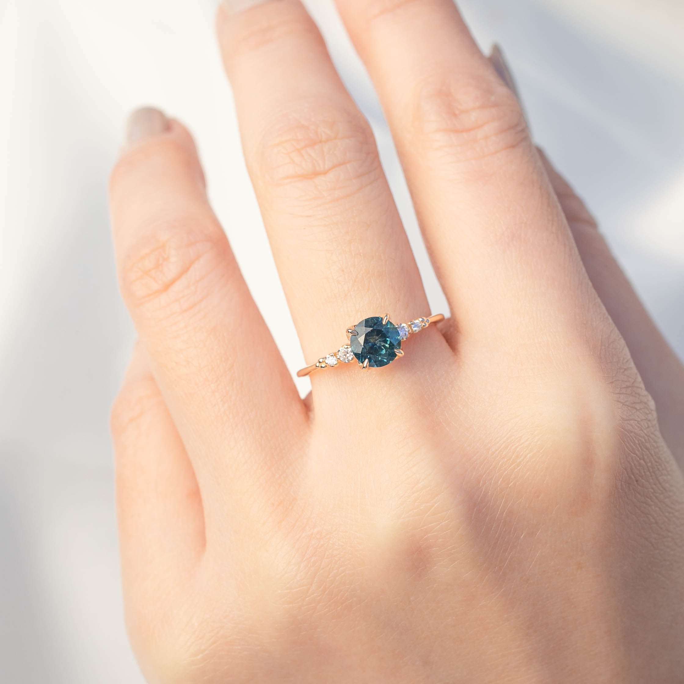 Estel Luxe Ring with 1.16ct blue green Montana sapphire, handmade with ethically sourced diamonds and recycled 14k gold.