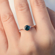 Lena Ring with 1.17ct teal Montana sapphire and diamonds in 14k rose gold, handmade and ethically sourced.
