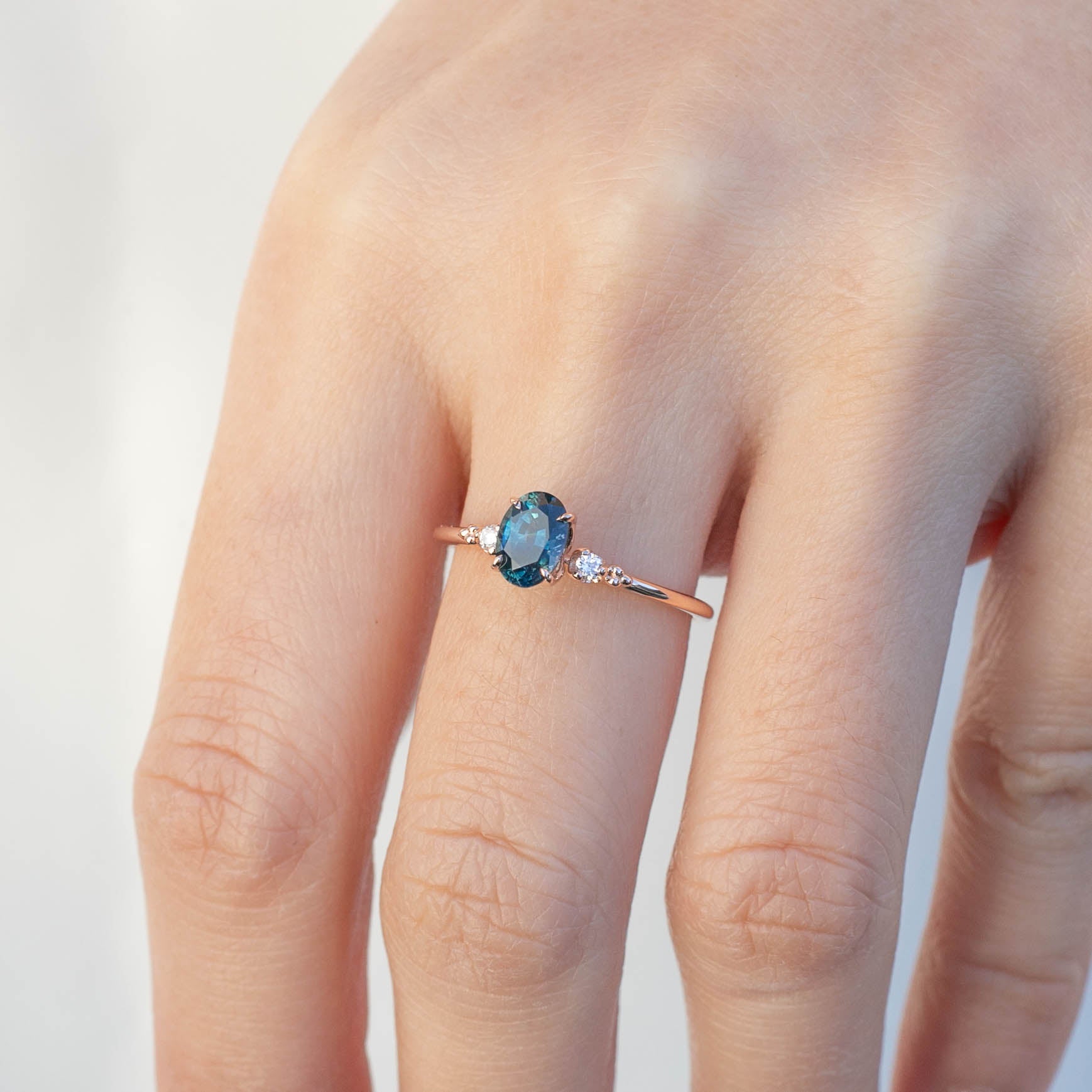Estel Ring with 0.83ct teal blue sapphire and diamonds set in 14k rose gold, handmade and one of a kind