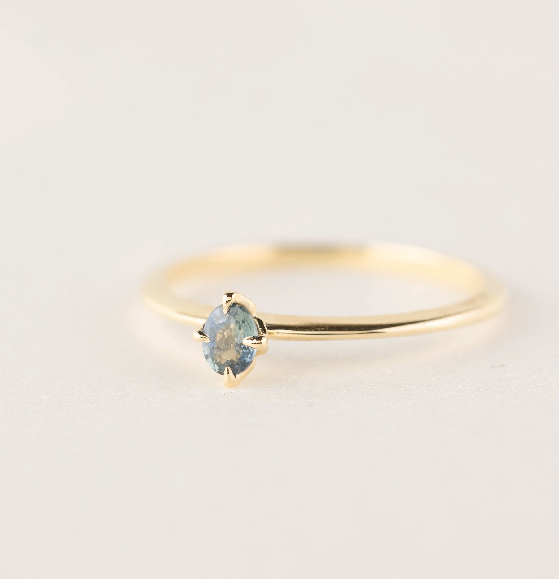 Oval unheated blue green sapphire solitaire 14k yellow gold ring