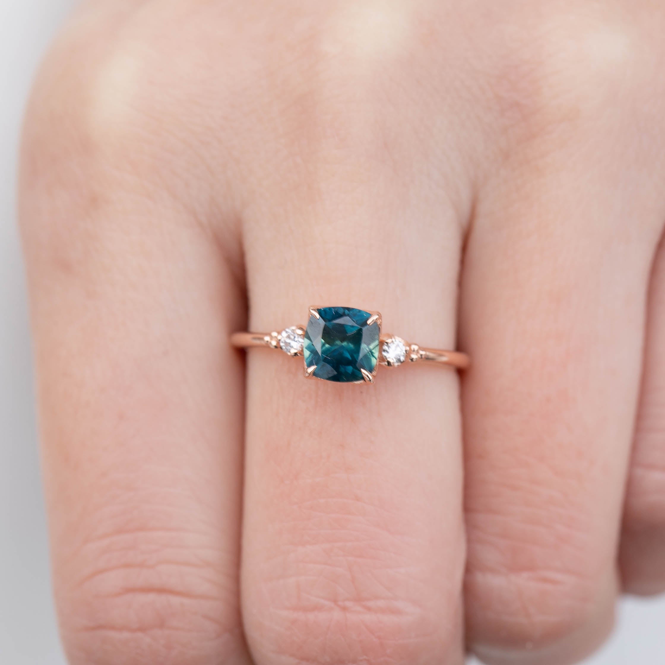 Estel Ring with 1.31ct cushion cut dark teal Montana sapphire in 14k rose gold, handmade and one of a kind.