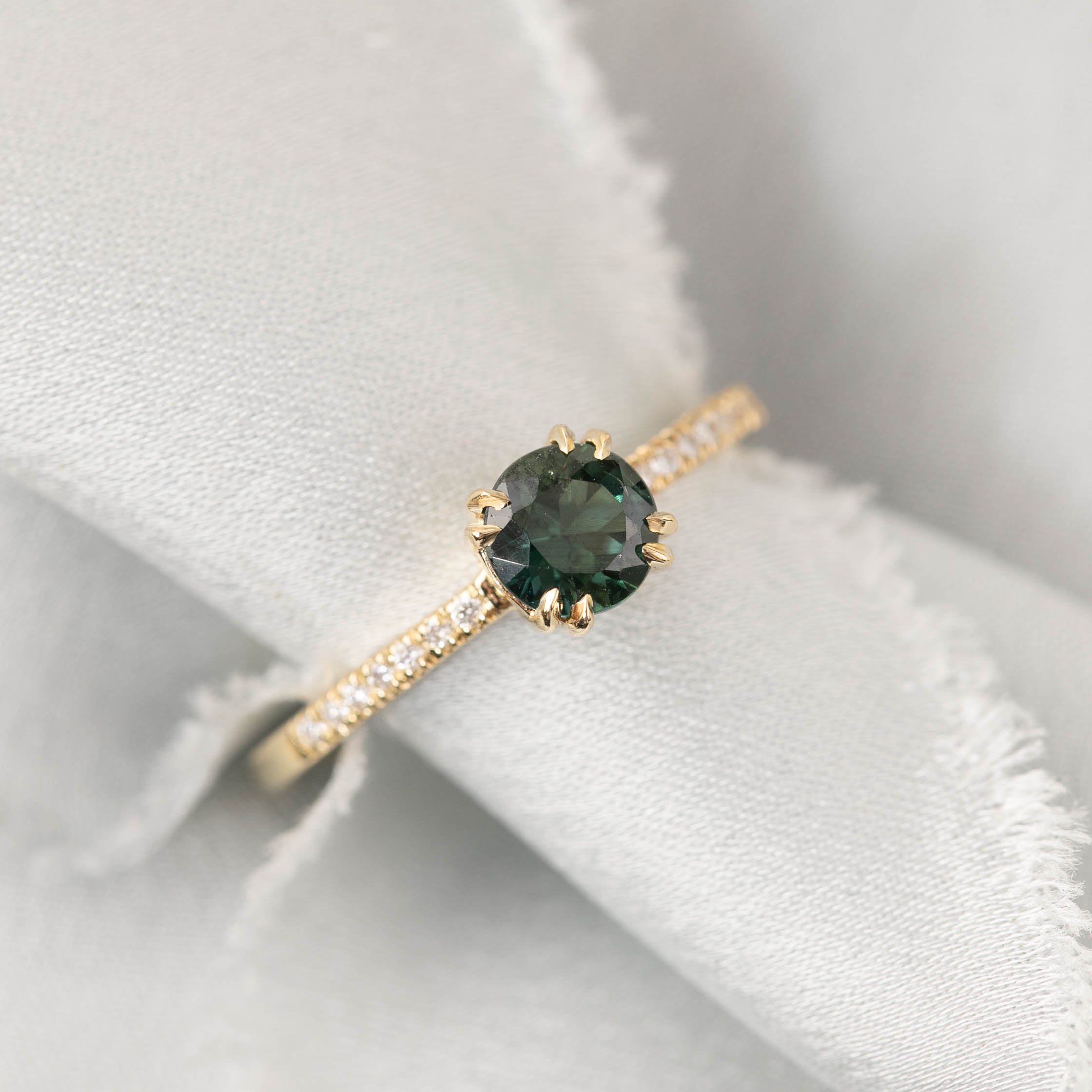 Sabrina Ring with 0.67ct Queensland Peacock Sapphire and white accent diamonds in 14k yellow gold band
