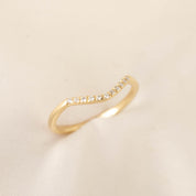 Esperanza Ring in solid gold with natural white diamonds, 0.067ctw, G color SI quality, on soft fabric background