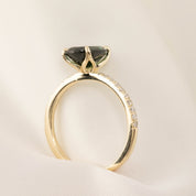 14k yellow gold ring with 1.53ct unheated oval green Queensland sapphire and natural accent diamonds