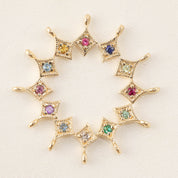 Circle of 14k gold star charms with various genuine birthstone gemstones in bezel settings for necklace customization.