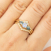 Olivia Ring featuring 0.5ct Ceylon blue sapphire with 0.4ctw teardrop sapphires set in recycled 14k gold band