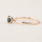 Sara Ring featuring 1.00ct green Montana Sapphire in a 14k rose gold tapered band with a 4-prong flower setting