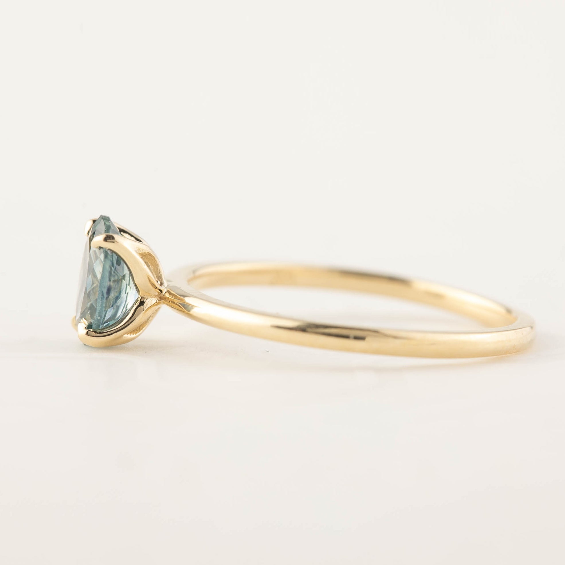 14k yellow gold ring with 1.00ct blue green Montana sapphire in high profile flower setting, size 7 adjustable 4-8.5