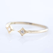 Delicate double star open ring with natural white diamonds set in ethically sourced solid gold band