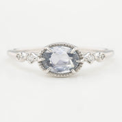 One of a kind Stella ring with 0.80ct unheated blue sapphire and white diamonds in 14k white gold band