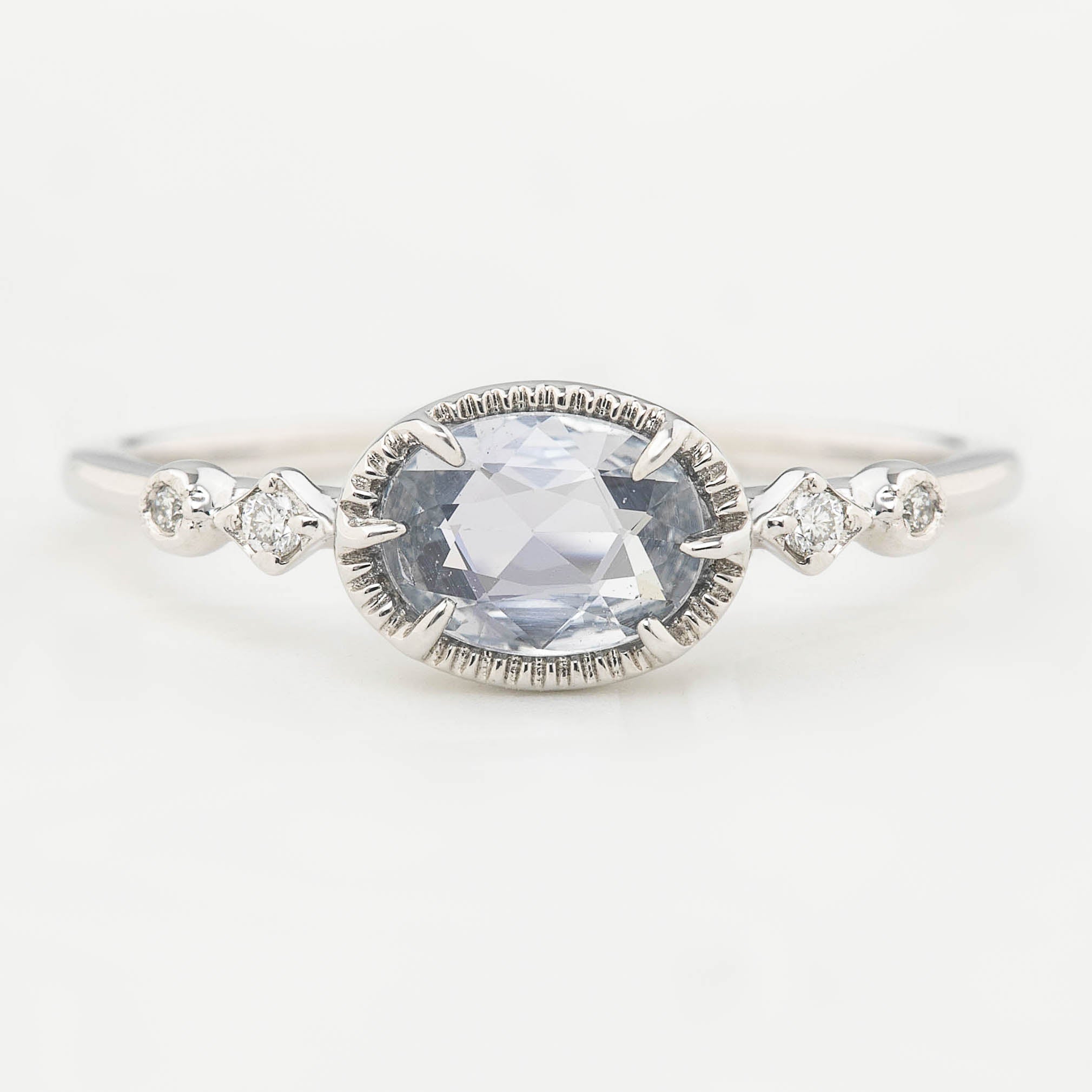 One of a kind Stella ring with 0.80ct unheated blue sapphire and white diamonds in 14k white gold band