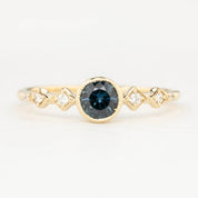 0.50ct teal blue Queensland Sapphire Ring in 14k yellow gold