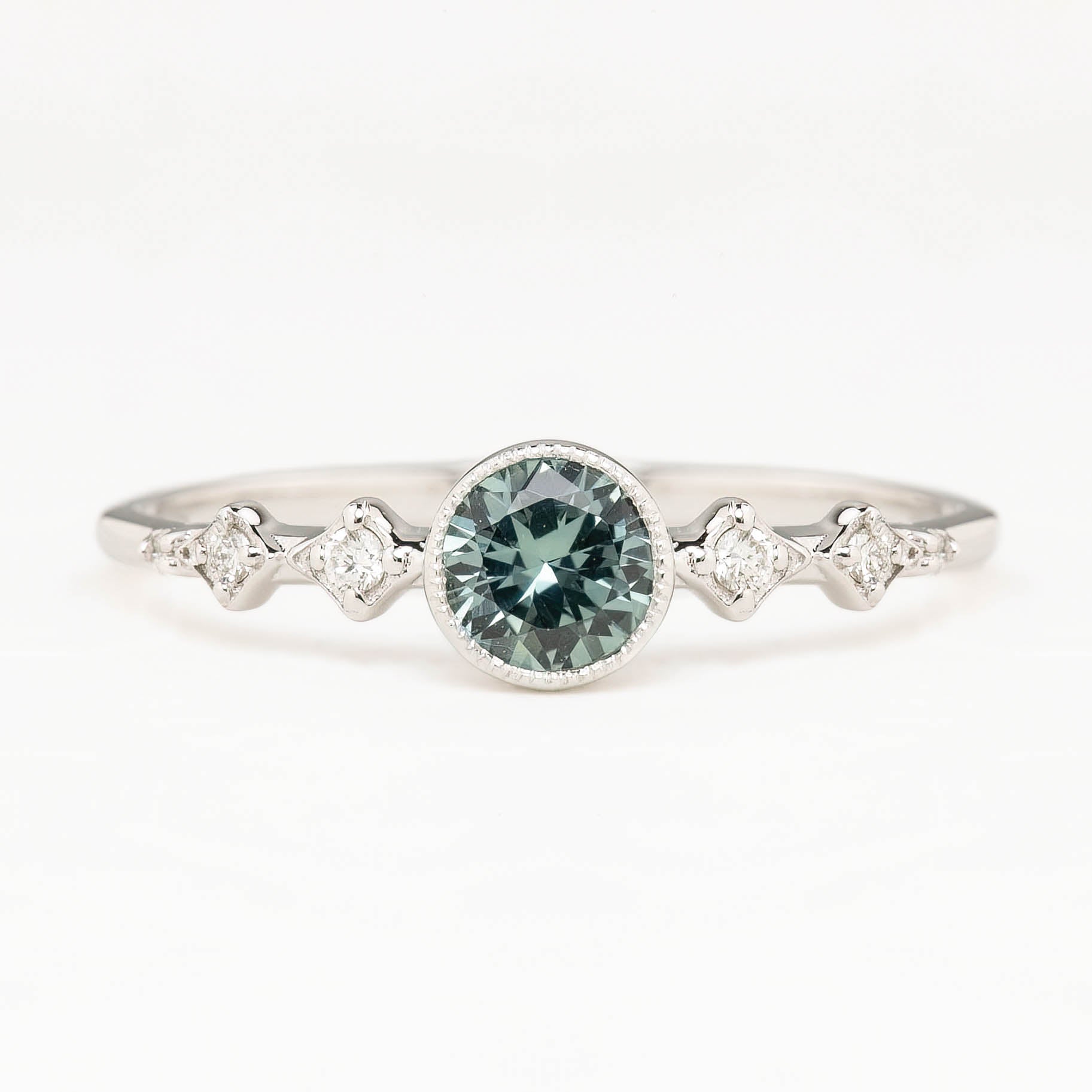 0.50ct blue green Queensland Sapphire Ring in 14k white gold