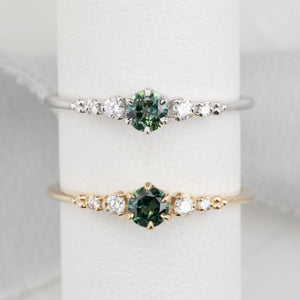 Estel Fleur Ring with a 0.30ct round deep blue Queensland sapphire and natural diamond accents in 14k white gold and 14k yellow gold